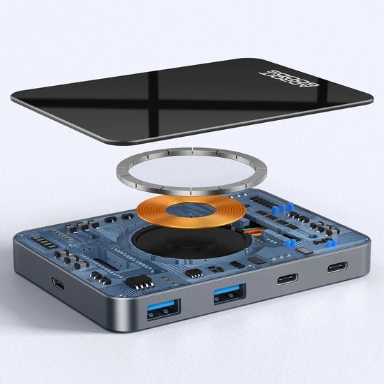 opengewerkte elektronica met draadloze oplaadspoel en USB-poorten in grijze behuizing