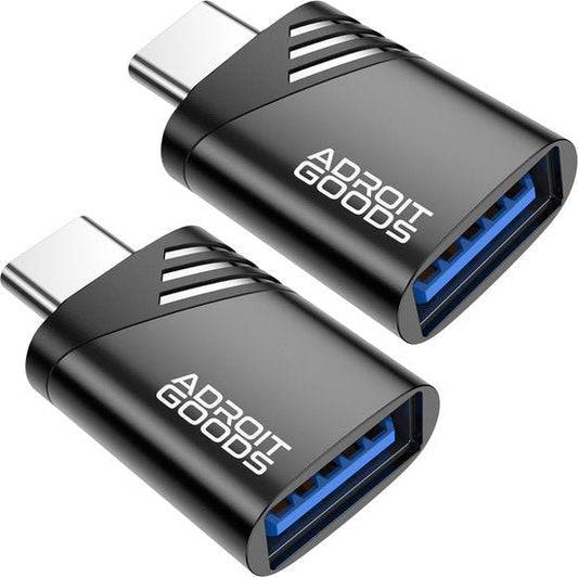 Twee zwarte USB-C naar USB 3.0 adapters met blauw binnenwerk en Adroit Goods logo.
