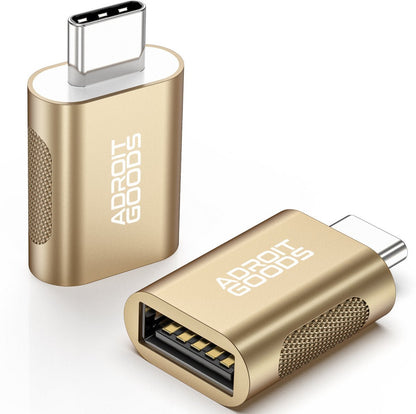 Gouden USB-C naar USB adapter met Adroit Goods logo en grip textuur aan de zijkant
