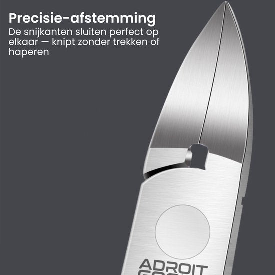 Close-up van een scherp metalen snijgereedschap met strakke snijkanten en tekst in het Nederlands.