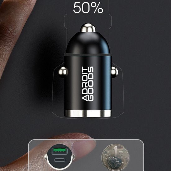 Zwarte compacte autolader met Adroit Goods logo naast een munt als schaalreferentie.