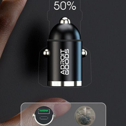 Zwarte compacte autolader met Adroit Goods logo naast een munt als schaalreferentie.