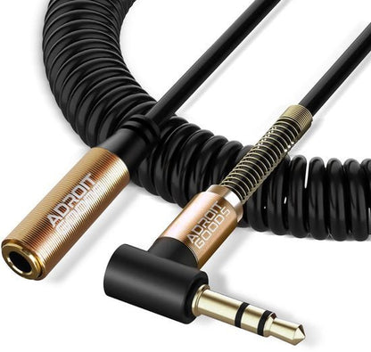 Zwarte spiraalkabel met goudkleurige AdroitGoods 3,5 mm audio jack connectoren en veerbescherming