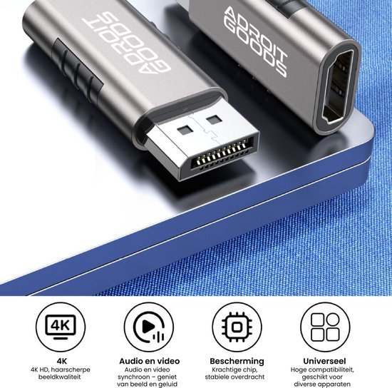 Usb-adapter met metalen behuizing en witte tekst op blauw oppervlak close-up afbeelding