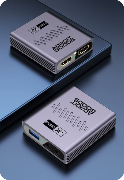 Twee zilverkleurige AdroitGoods 4K USB 3.0 adapters met HDMI- en audioaansluitingen