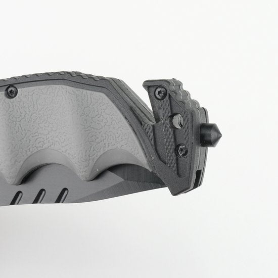 grijs zwart zakmes met getextureerd handvat en veiligheidsklem detail close-up