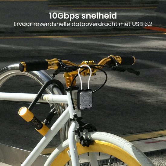 Fiets met wit en geel frame en een klein zwart apparaat bevestigd aan het stuur