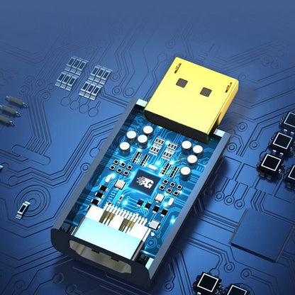 Close-up van een elektronische USB-connector met zichtbare blauwe printplaat en componenten