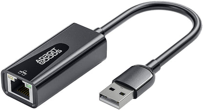 Zwarte USB naar Ethernet adapter met kabel en logo van Adroit Goods zichtbaar