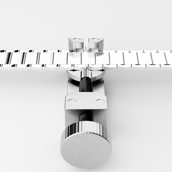 Zilverkleurig metalen gereedschap voor het inkorten en aanpassen van horlogebandjes nauwkeurig en stevig