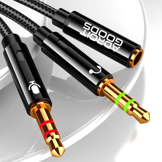 detaillierte afbeelding van zwarte audioverloopkabels met gouden aansluitingen en gevlochten mantel