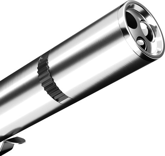 glimmend metalen cilindervormig object met draaibare ring en drie openingen aan voorkant