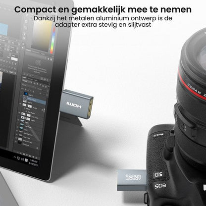 Compact aluminium adapter aangesloten op camera en tablet voor eenvoudige verbinding