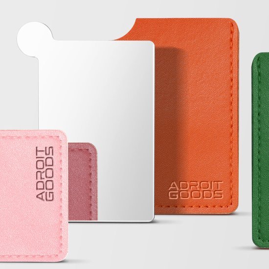 reflecterend schermbeschermer met gekleurde leren hoesjes in roze, oranje en groen