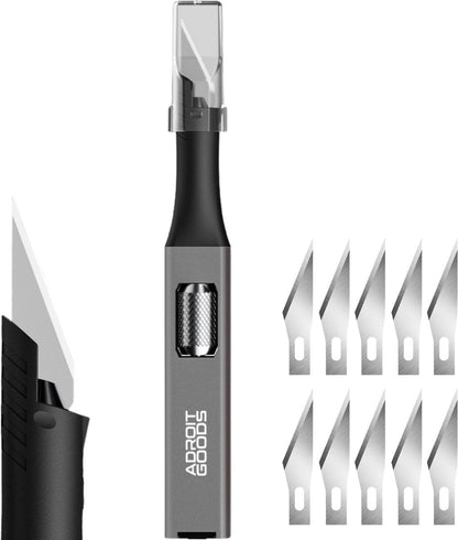 set van scherp mesje met houder en vervangbare lemmetten naast elkaar geplaatst