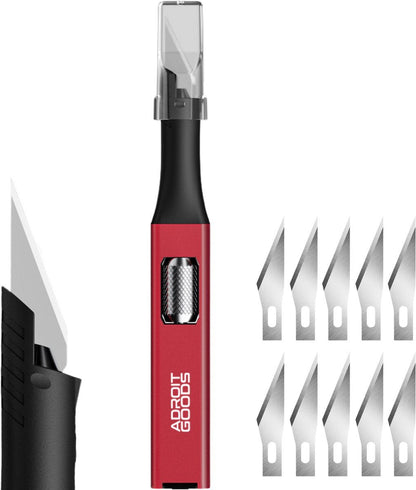 rode precisiesnijder met verwisselbare metalen mesjes en zwarte handgreep