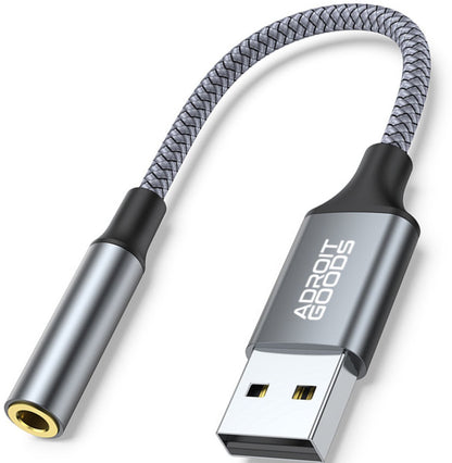 Grijze gevlochten kabel met USB en 3,5 mm audiopoort voor eenvoudige aansluiting.