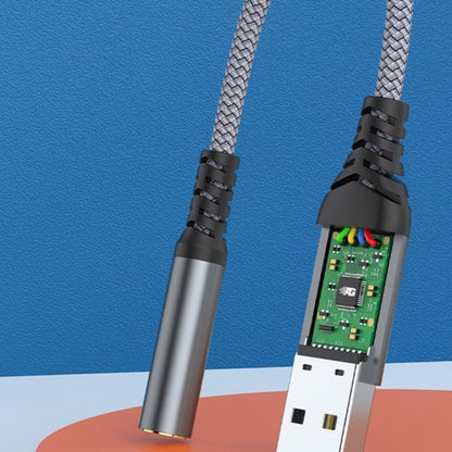 Grijze gevlochten kabel met USB-connector en zichtbare elektronische componenten in aansluitstuk
