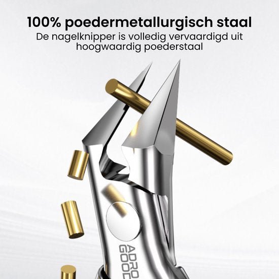 close-up van een nagelknipper van hoogwaardig poedermetaal met gouden kogels eromheen