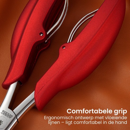 rood ergonomisch keukengerei met comfortabele grip en gladde metalen onderdelen