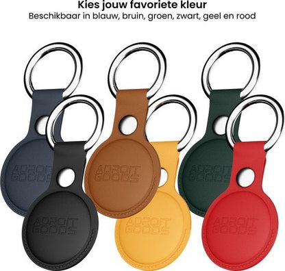 Zes leren sleutelhangers in verschillende kleuren met metalen ringen en AdroitGoods logo.