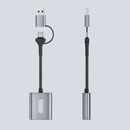 Zwarte en zilveren USB-adapter met verschillende aansluitingen voor gegevensoverdracht en opladen