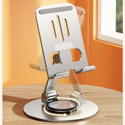 verstelbare metalen telefoonhouder met draaibare base op houten tafel bij venster