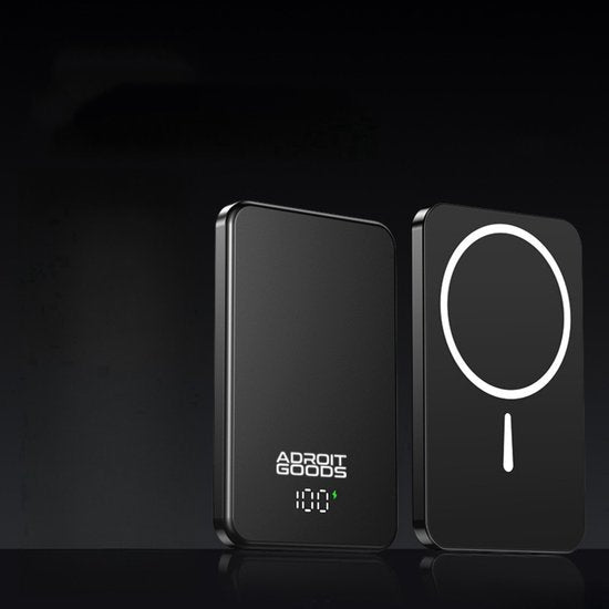 Zwarte draadloze oplader met display en wit cirkelontwerp op glad oppervlak van AdroitGoods