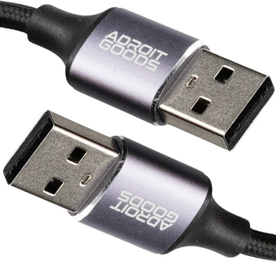 twee usb-a kabels met metalen behuizing en tekst Adroit Goods in grijstinten