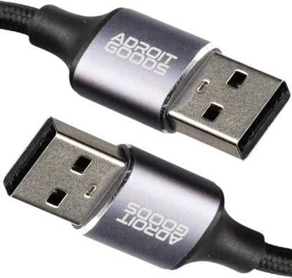 twee usb-a kabels met metalen behuizing en tekst Adroit Goods in grijstinten