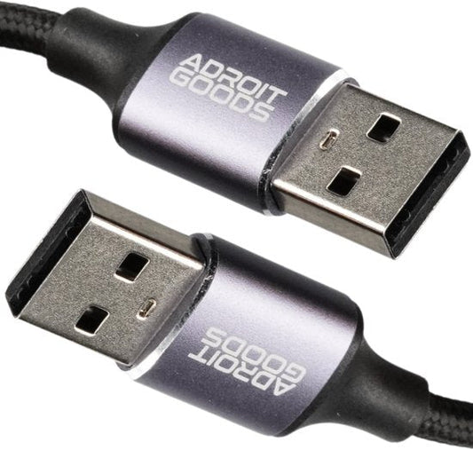 twee usb-a kabels met metalen behuizing en tekst Adroit Goods in grijstinten