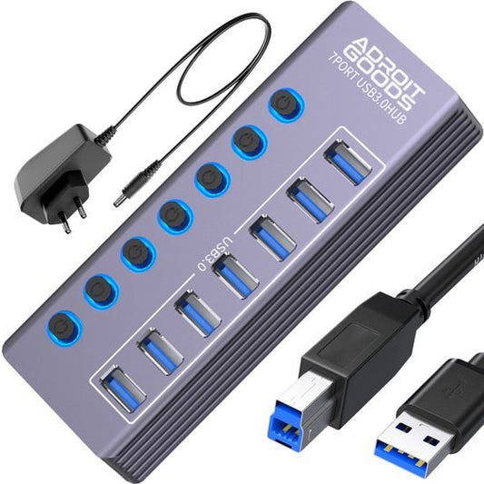 Grijze USB 3.0 hub met zeven poorten, individuele aan-uitknoppen en bijbehorende kabels