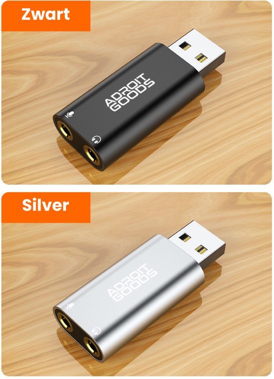 Zwarte en zilveren USB-adapters met dubbele audio-ingangen op houten ondergrond