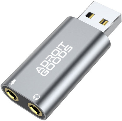 compact zilverkleurig usb-adapter met twee audio-ingangen voor microfoon en koptelefoon