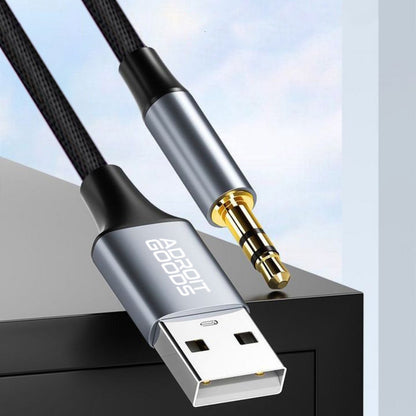 usb naar 3,5 mm audiokabel met metalen behuizing en gevlochten kabel in zwart