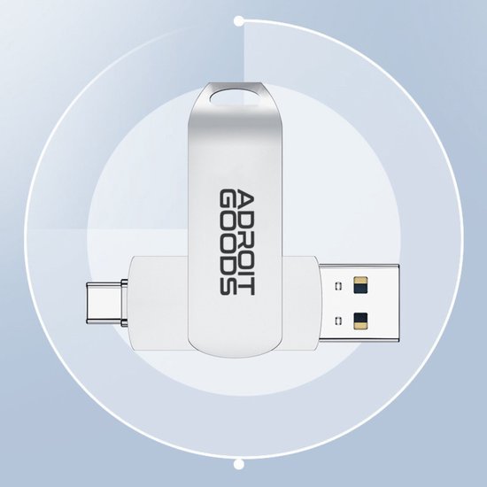 USB-stick met draaibare metalen behuizing en twee aansluitingen op een blauwe achtergrond