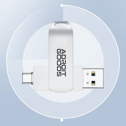 USB-stick met draaibare metalen behuizing en twee aansluitingen op een blauwe achtergrond