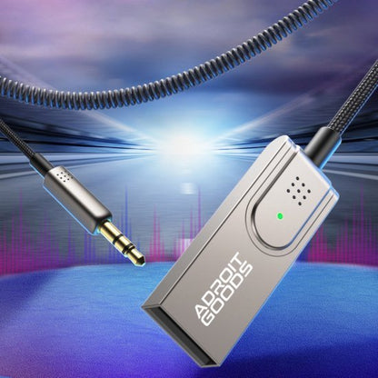 Zilverkleurige AdroitGoods audioadapter met 3,5 mm jack en flexibele kabel in futuristische omgeving