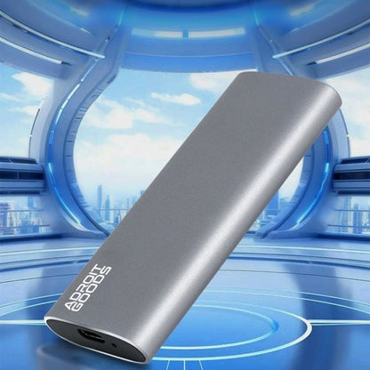 grijze compacte powerbank met strak design en AdroitGoods logo op futuristische achtergrond