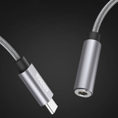 slanke zilveren usb-c naar 3,5 mm audio adapterkabel met gevlochten omhulsel
