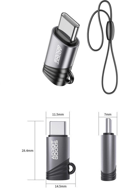 Grijze compacte USB-C adapter met zwarte accenten en een bevestigingssnoer naast afmetingen.