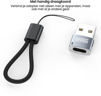 Zilverkleurige USB-adapter met zwart draagkoord voor eenvoudig meenemen en verbinden.