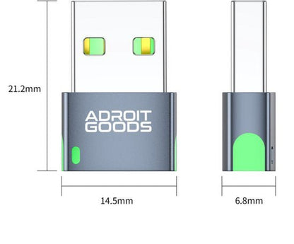 Compact zwarte USB-adapter met groene accenten en merknaam Adroit Goods zichtbaar.