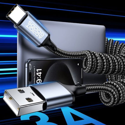 Duurzame gevlochten USB-C naar USB-kabel met metalen connectoren naast smartphone en laptop