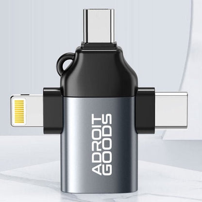 Adapter met drie verschillende aansluitingen in zwart en zilver met merknaam Adroit Goods zichtbaar