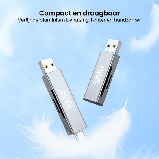 Twee zilverkleurige USB-sticks met aluminium behuizing zwevend op blauwe achtergrond met veren