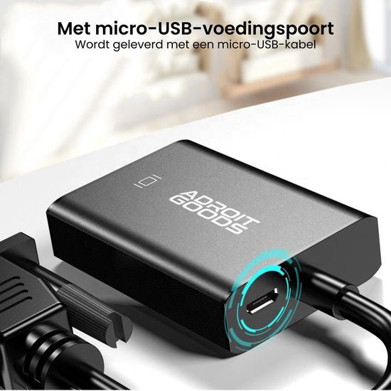 Zwarte AdroitGoods adapter met micro-USB-voedingspoort en meegeleverde kabel op tafel